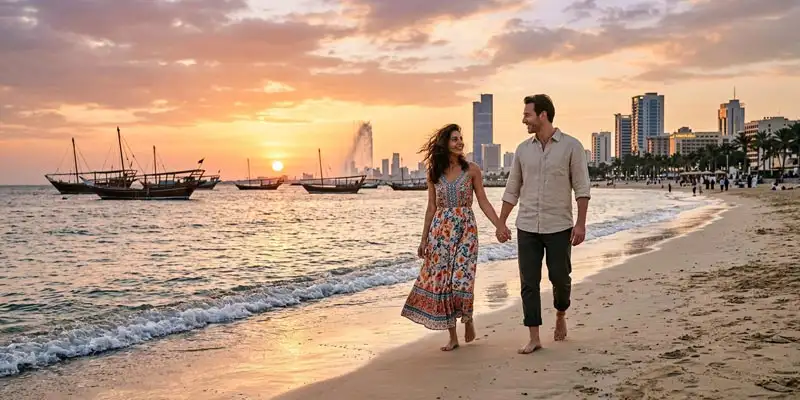 A romantic couple walking barefoot and hand-in-hand along the sandy shore of the Red Sea at sunset, featuring the iconic King Fahd’s Fountain and the city skyline in the background—a perfect illustration of the Top Romantic Things to Do in Jeddah for Couples.